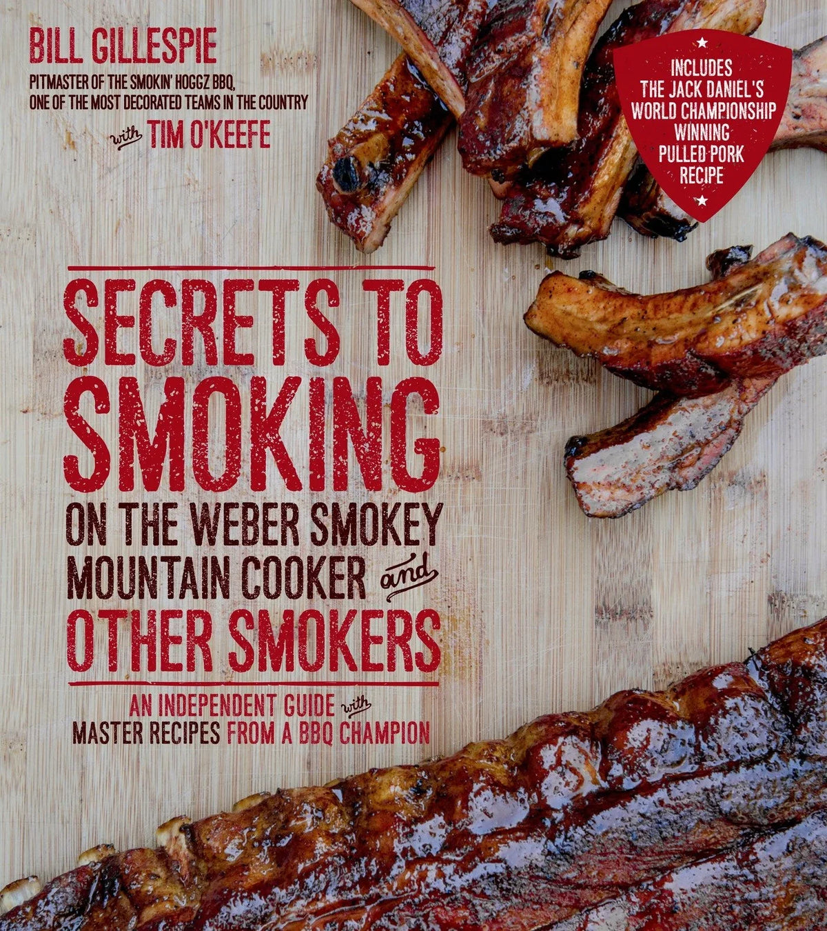 Book cover of 'Secrets to Smoking' with barbecued meats and recipe card on wooden background
