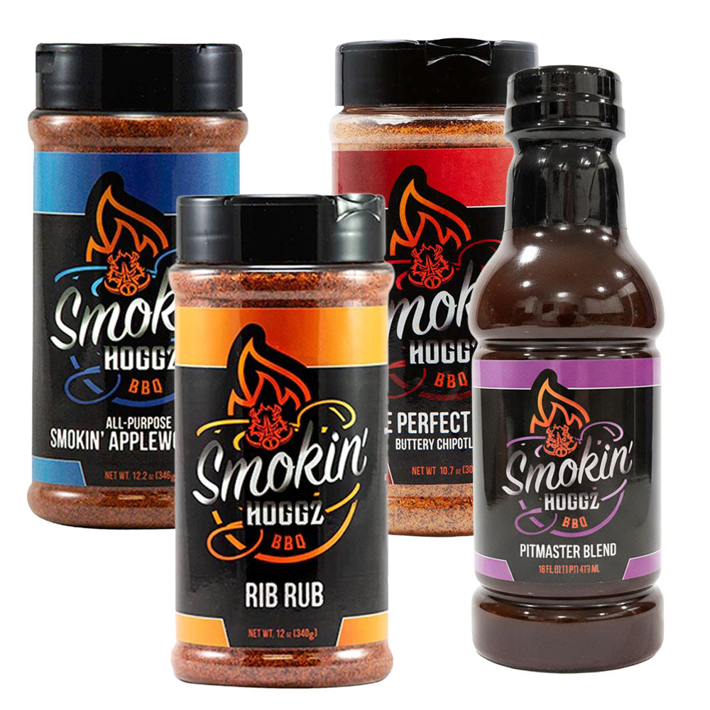 Collection of Smokin' Huggz BBQ products including jars and a bottle on a white background